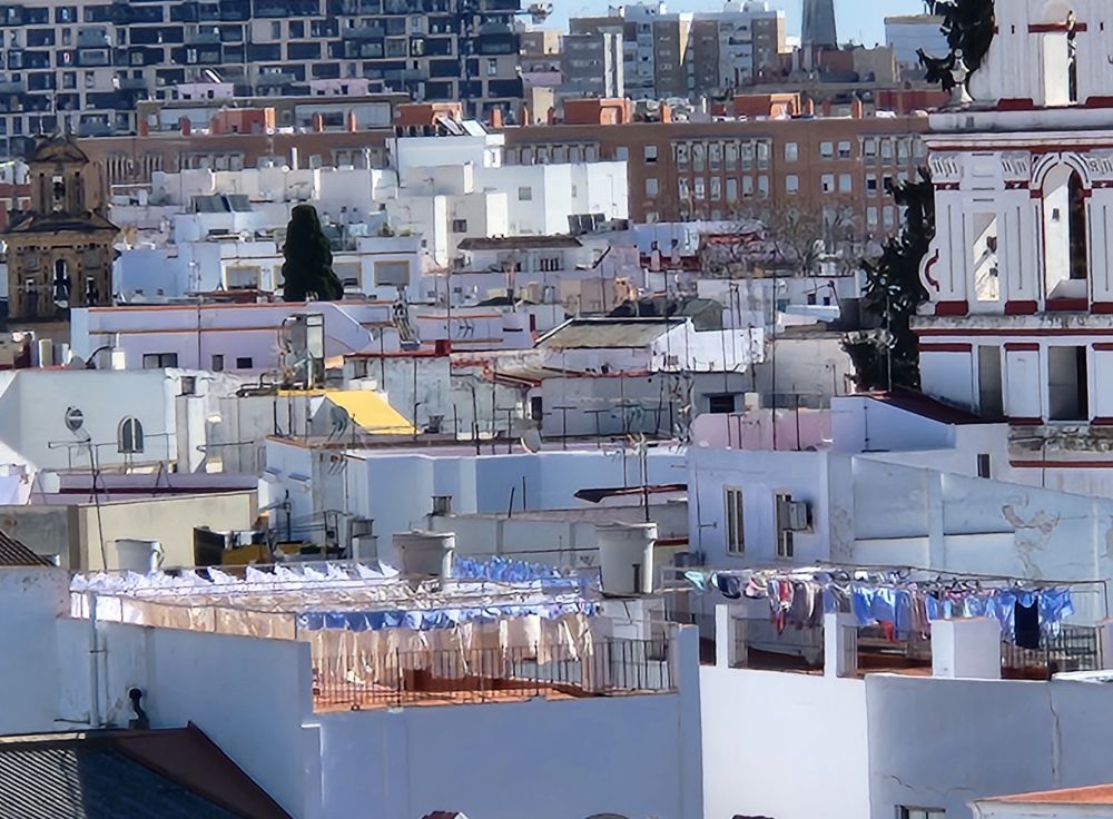 Spotting laundry on the line is a unique travel hobby, especially in Seville from Las Setas.