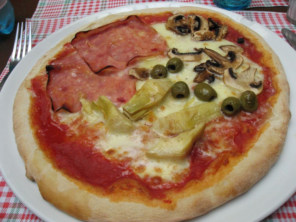 Pizza in Naples highlighting the joy of finding exceptional pizza in unexpected places.